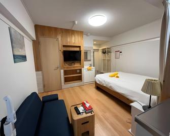 Hotel Rhodes - Tokio - Schlafzimmer