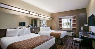 Microtel Inn & Suites by Wyndham Sidney - Sidney - Bedroom