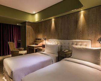 فندق انهاوس - مدينة تايبيه - غرفة نوم