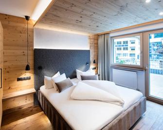 Alpenland Gerlos - Hotel & Breakfast - גרלוס - חדר שינה