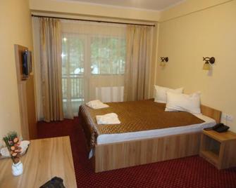 Pensiunea Bucura - Calimanesti Caciulata - Bedroom