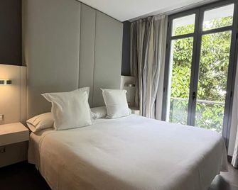 Hotel Avenida 31 - San Pedro de Alcántara - Bedroom