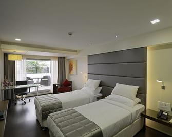 Hotel Grande 51 - נבי מומבאי - חדר שינה