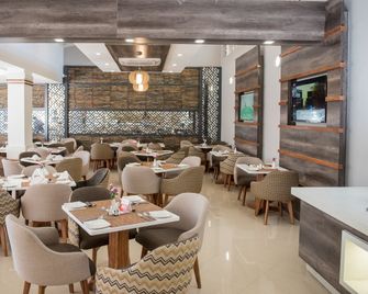Holiday Inn Mutare By IHG - Mutare - Restaurante