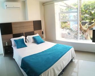 Hotel Corona Real Tuluá - Tuluá - Habitación
