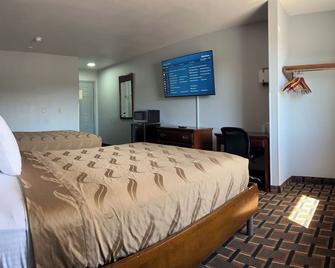 Americas Best Value Inn and Suites Albemarle - Albemarle - Bedroom
