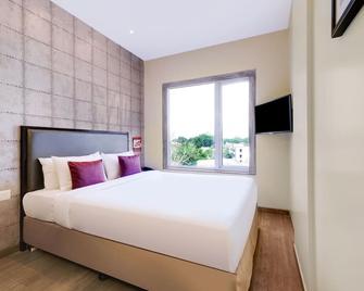 7 Apple Hotel, Vadodara - ואדודרה - חדר שינה