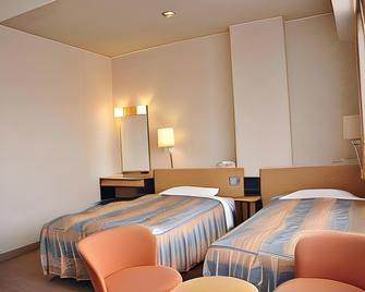 Hotel Kamoike Plaza - Kagoshima - Bedroom