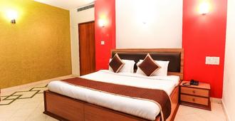 Hotel The Sunrise - Udaipur - Bedroom