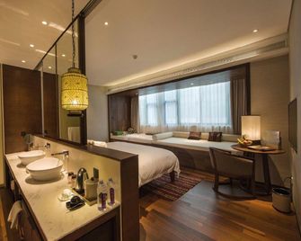 Manyue Select Holiday Hotel - Shangrao - Schlafzimmer