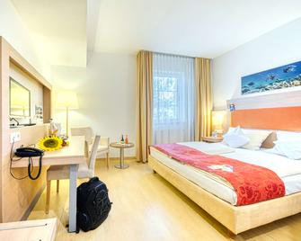 Akzent Hotel Aufkirchen - Aufkirchen - Schlafzimmer