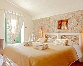 Podere La Gualda Vecchia alloggi di charme immersi nel Giardino Emozionale outdoor SPA - Monteverdi Marittimo - Bedroom