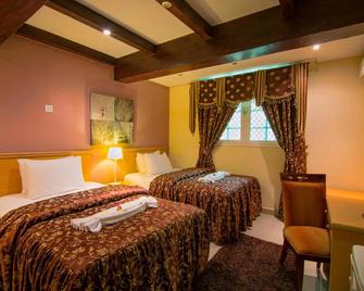 Mutrah Hotel - Muscat - Bedroom