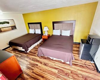 Most Affordable Motel Rooms in Iola - Regency Inn iola - Iola - Bedroom