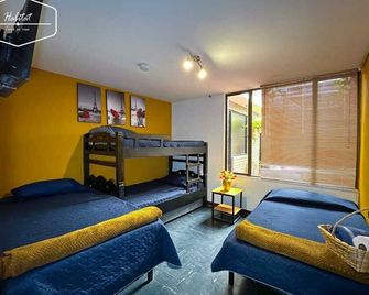 Hotel Habitat Hospedaje - Bogotá - Schlafzimmer