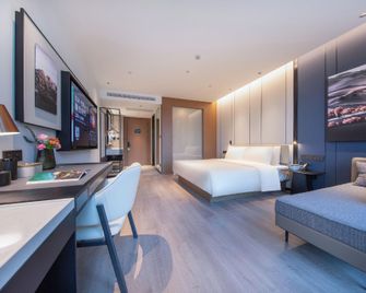 Atour Hotel Jinan Huashan Huanyu Max - ז'ינאן - חדר שינה