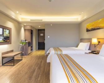 Home Inn Plus Chengdu East Railway Station Chengyu Interchange Metro Station - Chengdu - Kamar Tidur