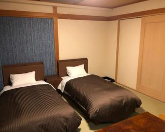 Ibusuki Kokoronoyado - Ibusuki - Slaapkamer