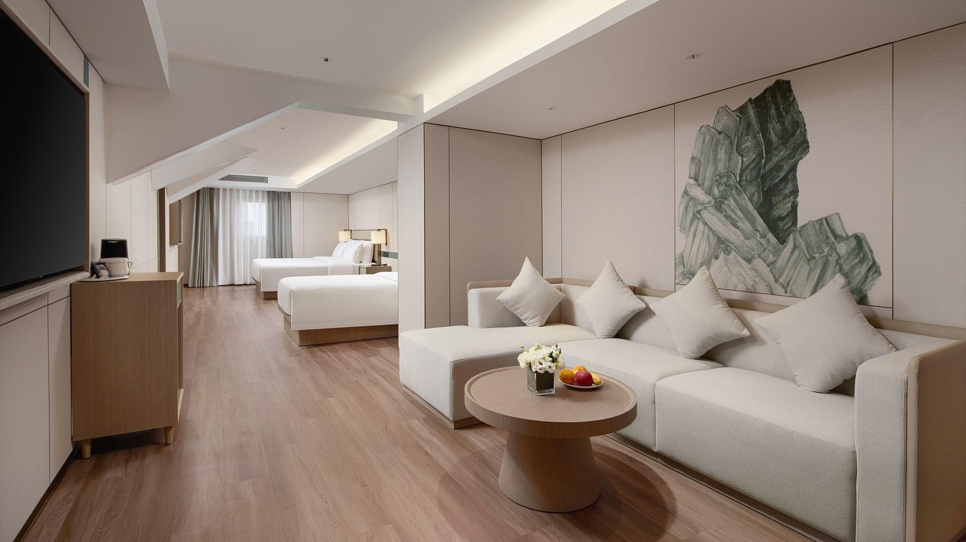 Manju Hotel (Dalian Henglong Plaza Xi'an Road Metro Station Branch) - داليان - غرفة نوم
