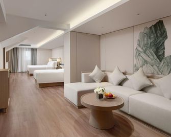 Manju Hotel (Dalian Henglong Plaza Xi'an Road Metro Station Branch) - Dalian - Quarto