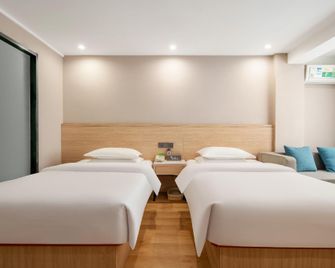 Vatica Yangzhou Dongguan Street Hotel - Yangzhou - Schlafzimmer