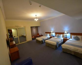 Grand Safir Hotel - Manama - Bedroom