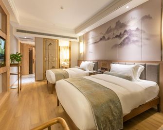 Lijing Hotel (Deyang Chengnan Branch) - Deyang - Bedroom