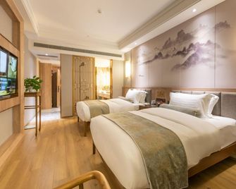 Lijing Hotel (Deyang Chengnan Branch) - Deyang - Bedroom