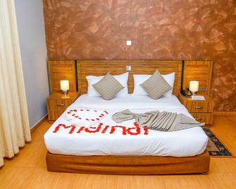 فندق ميدندي - أكرا - غرفة نوم