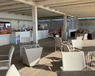 Casavacanzekastalia 2 'La Rossa' at the Athena Resort Ragusa Tourist Village - Ragusa - Restaurant