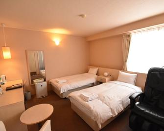 Hotel The Grand Court Matsusaka - Matsusaka - Schlafzimmer