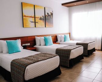 Hotel Cucuve - פוארטו איורה - חדר שינה