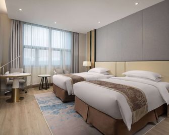 رامادا باي ويندام شانغهاي بودونج - شنغهاي - غرفة نوم
