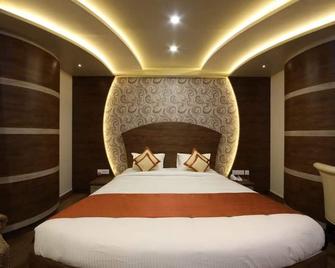 Aaccord Suites Inn - 班加羅爾 - 臥室