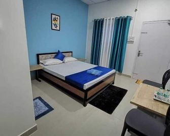 The Corner Inn - Guwahati - Bedroom