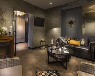 فندق إنترناسيونال باريس - باريس - غرفة معيشة