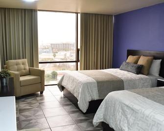 Hotel Corona Plaza - רוסריטו - חדר שינה