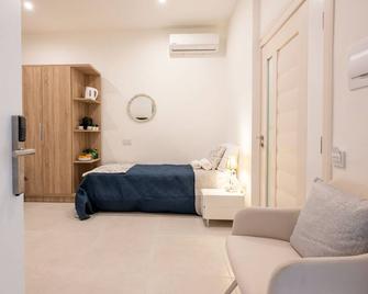 Vela Blu Boutique Suites - Гзіра - Спальня