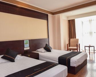 Mingdu Junyue Business Hotel - Bengbu - Bedroom