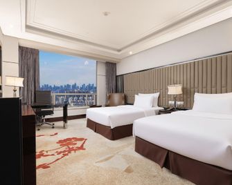 Xindao International Hotel - Yichang - Schlafzimmer