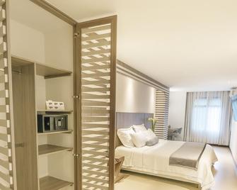 Aparta Suites Torre Poblado - Medellín - Bedroom