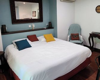 Evasion Bungalow D'antan Spa - Sarraméa - Bedroom