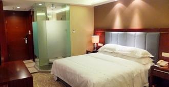 Mianyang How Right Hotel - Mianyang - Bedroom