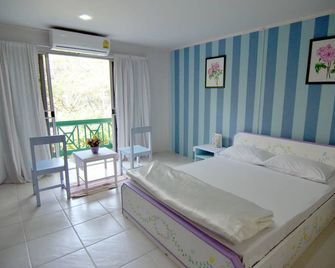 ماكماي فيلا - رايونغ - غرفة نوم