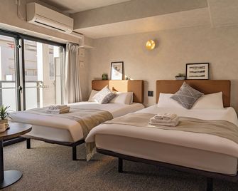 Apartment Hotel 11 Kuromon II - Osaka - Bedroom