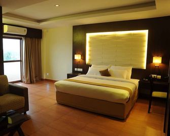 Castle International Premium Hotel - Kushālnagar - Chambre