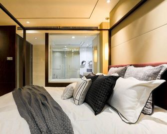 Mingsu Justin Boutique Apartment (Tianjin Binjiang Road) - تيانجين - غرفة نوم
