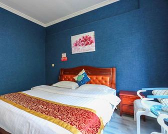 Xinyijia Hotel - Chengdu - Bedroom