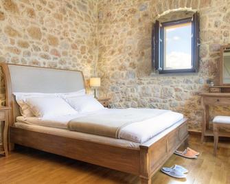 Korona Boutique Hotel - Oitylo - Camera da letto