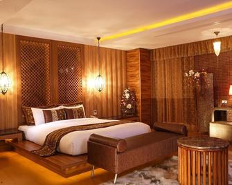 ميري سيزون موتل - مدينة كاوهسيونغ - غرفة نوم